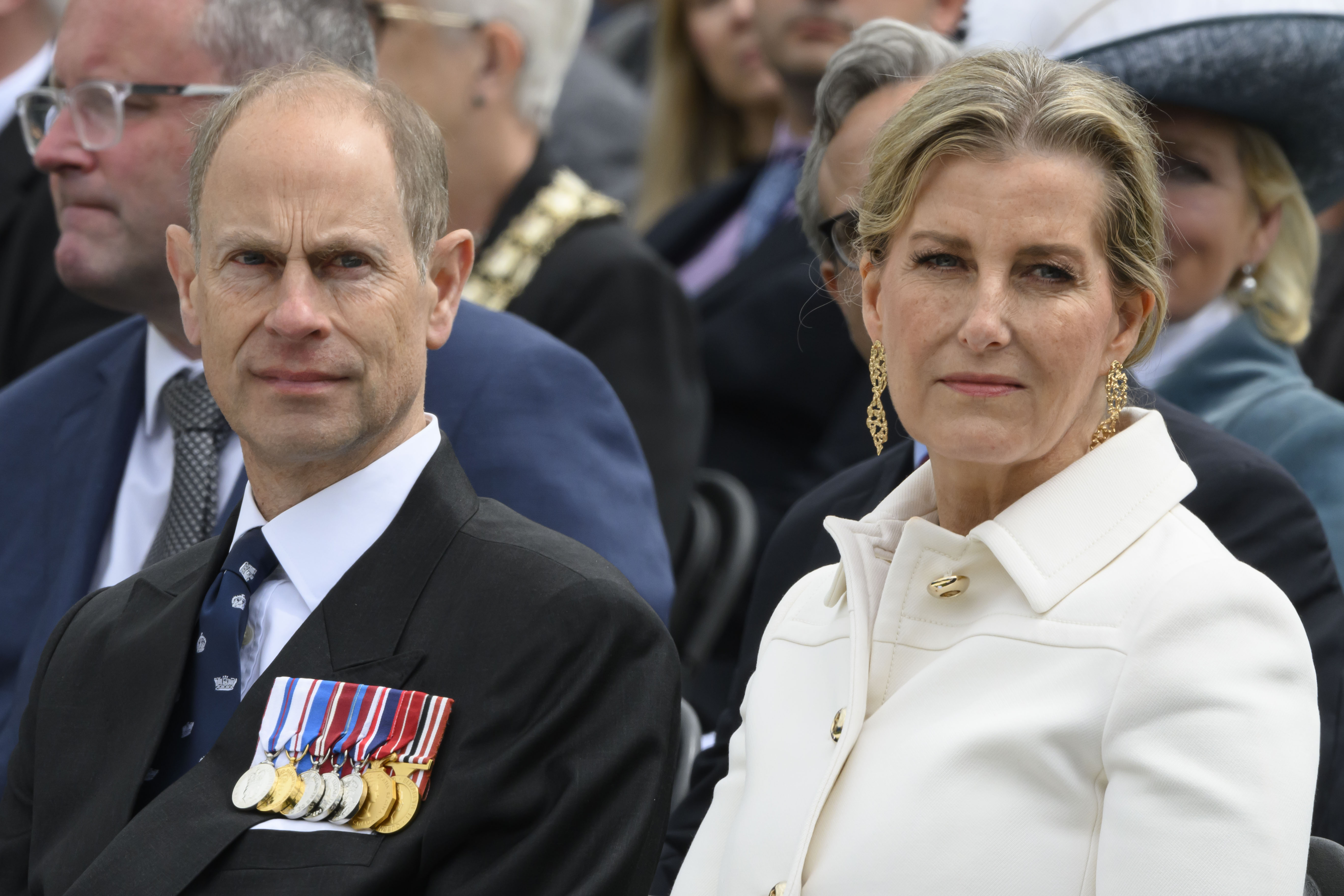 Prince Edward and Duchess Sophie with serious expressions