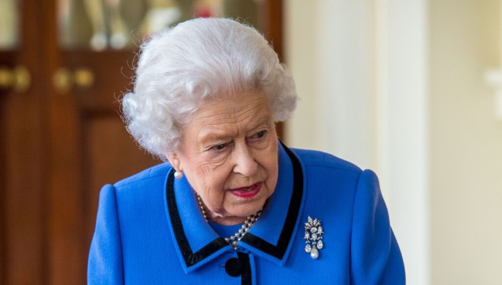 Queen Elizabeth II in blue outfit