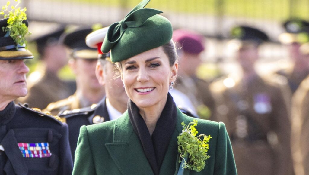 Kate Middleton smiling in green outfit