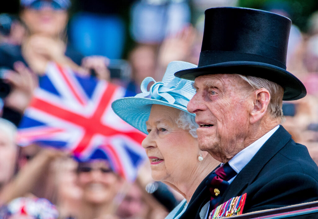 Queen Elizabeth II and Prince Philip in a carriage together