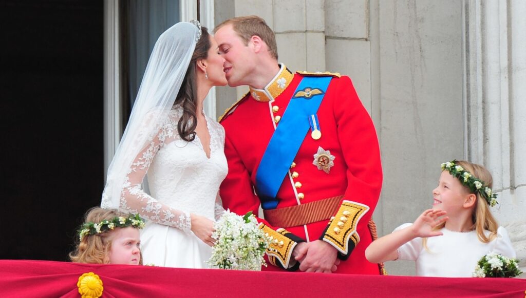 Kate Middleton and Prince William kissing on their wedding day
