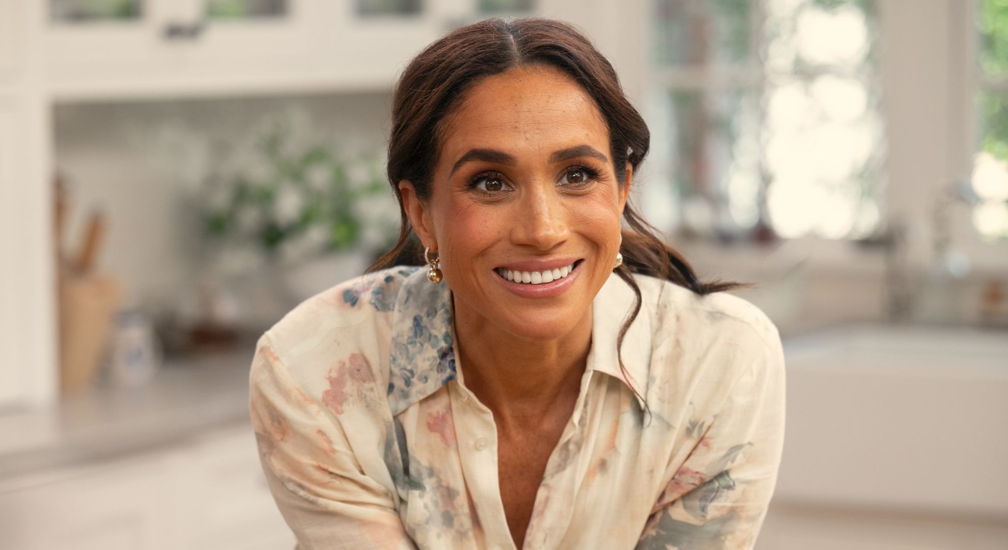 Carefree Meghan Markle runs on the beach in stunning photo as she looks forward to the 'future'