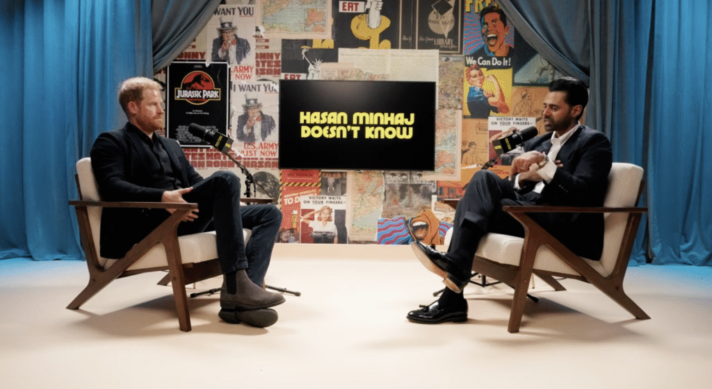 Prince Harry and Hasan Minhaj on podcast in studio room