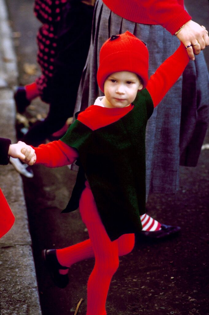 Young Prince Harry dressed as a red goblin