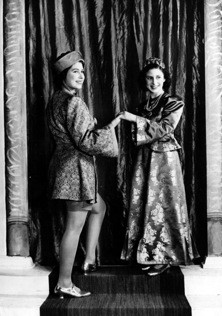 Princess Elizabeth and Princess Margaret wearing Aladdin themed costume
