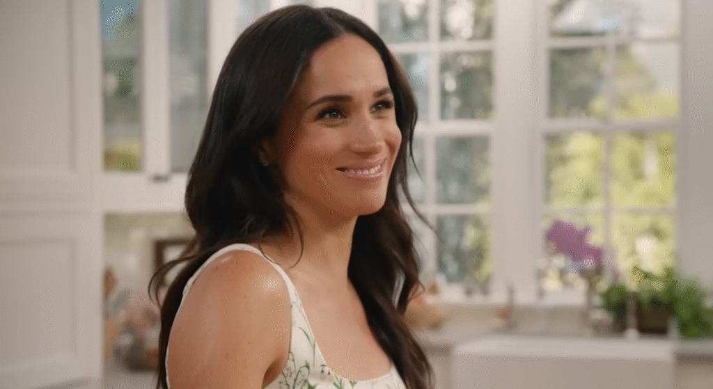 Meghan Markle smiling in her kitchen
