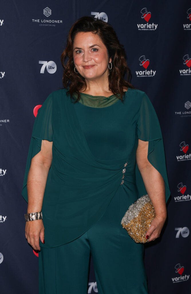 Ruth Jones in green outfit at event
