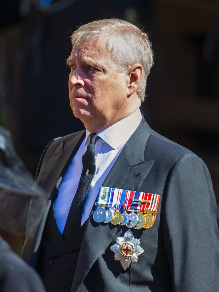 Andrew Mountbatten Windsor in black suit upset