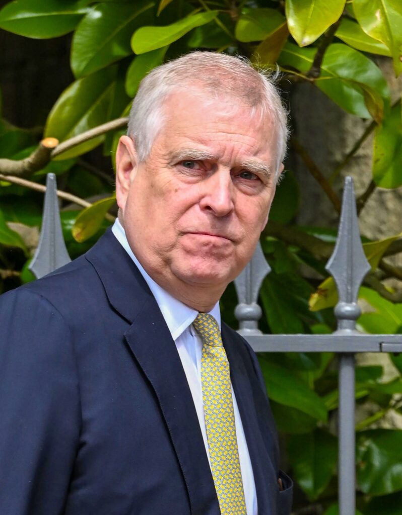 Prince Andrew looking at camera outside
