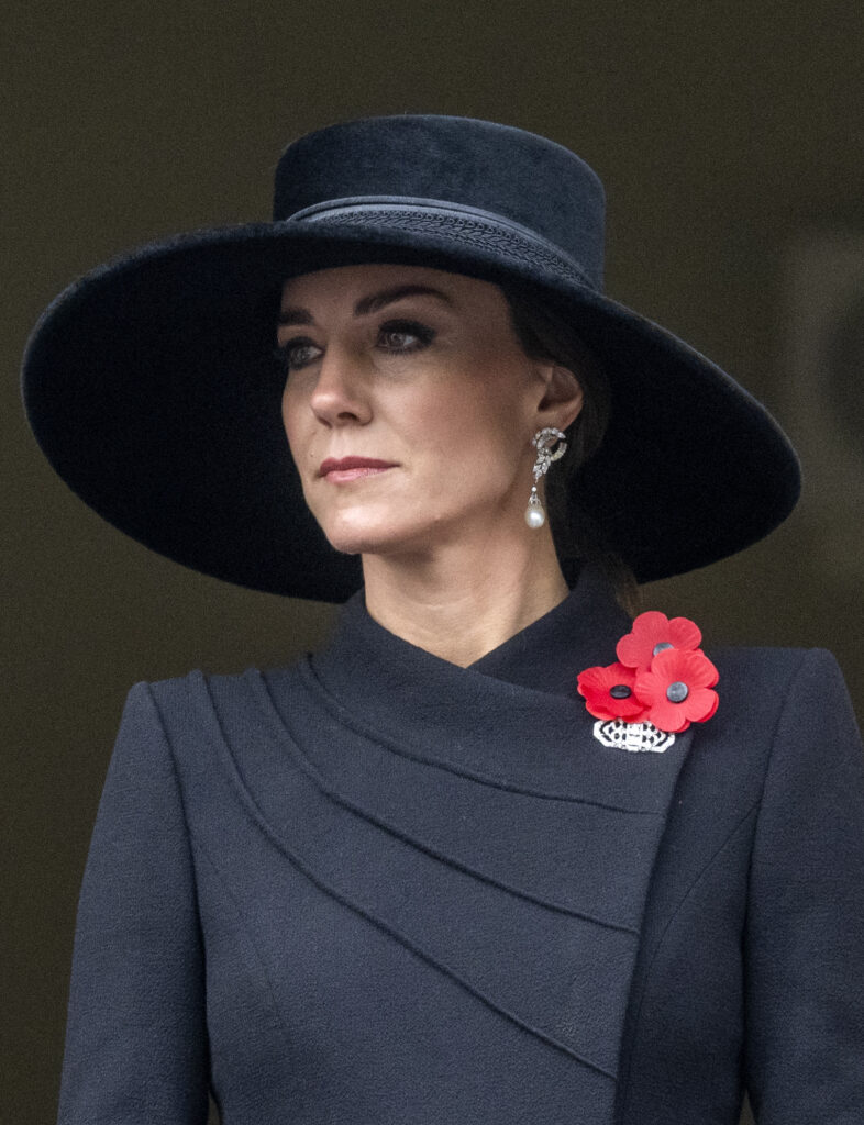 Kate Middleton wearing a black hat and a poppy on Remembrance Day