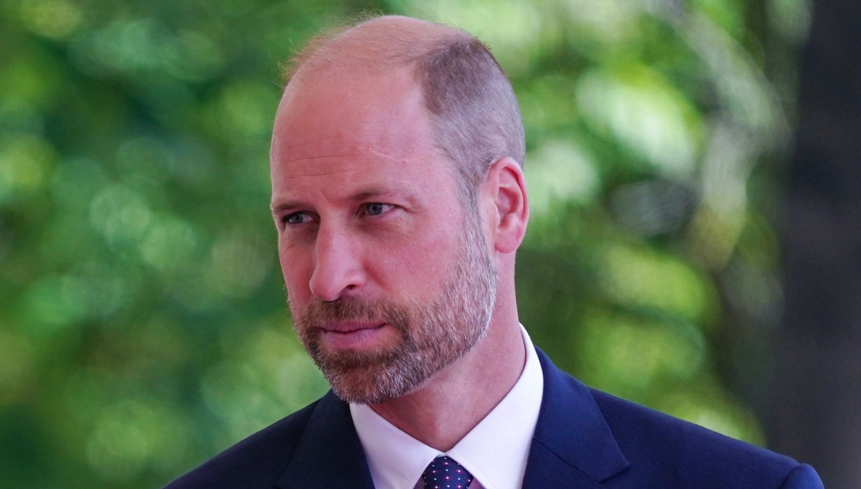 Heartwarming moment Prince William is hugged by woman during North Wales visit