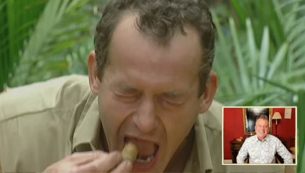 Paul Burrell doing an eating challenge I'm A Celebrity