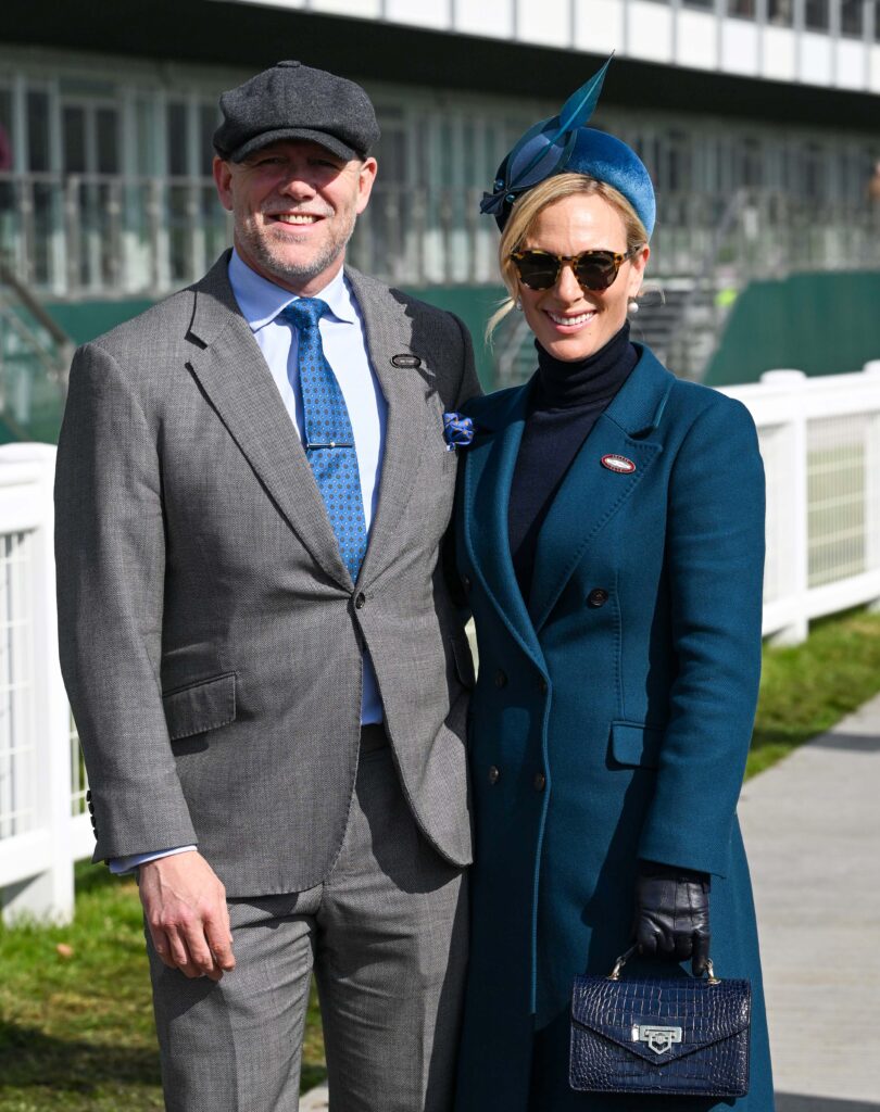 Mike and Zara Tindall smiling at the races