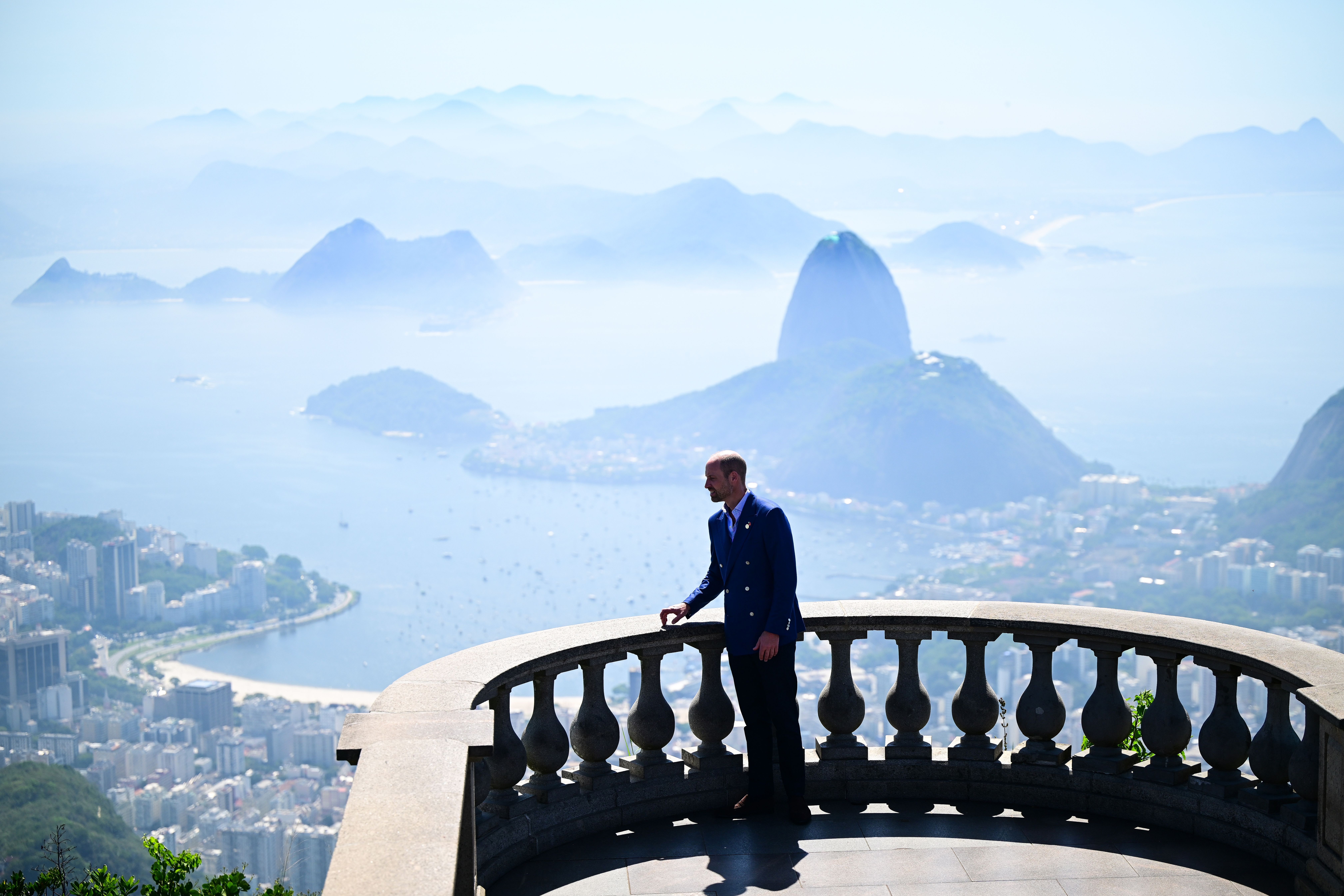 Prince William looks at the view of Sugarloaf Mountain emerging on the far side of the bay, exactly the same place his Mother Princess Diana stood in April 1991 in Rio de Janeiro