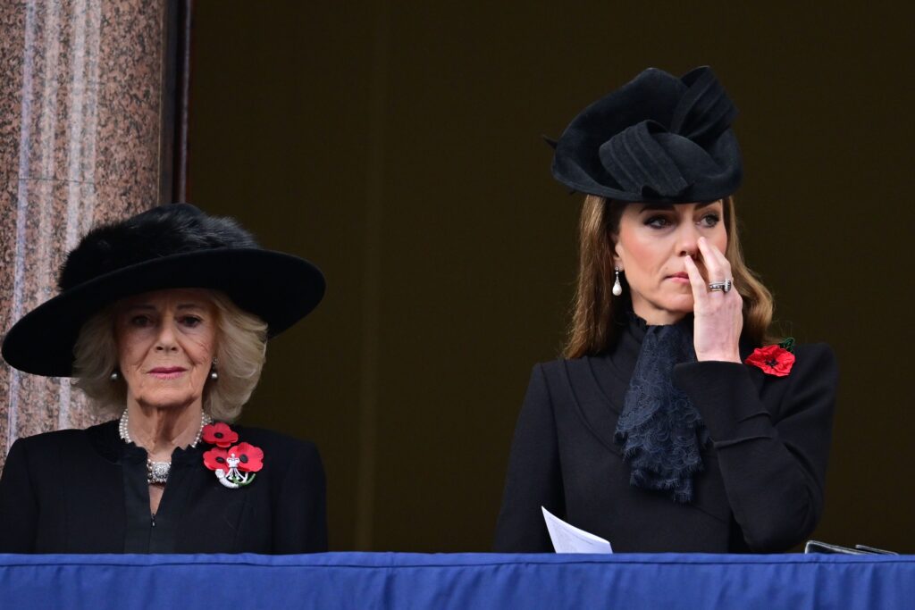 Queen Camilla frowning beside a sombre looking Kate Middleton at the Remembrance Sunday 