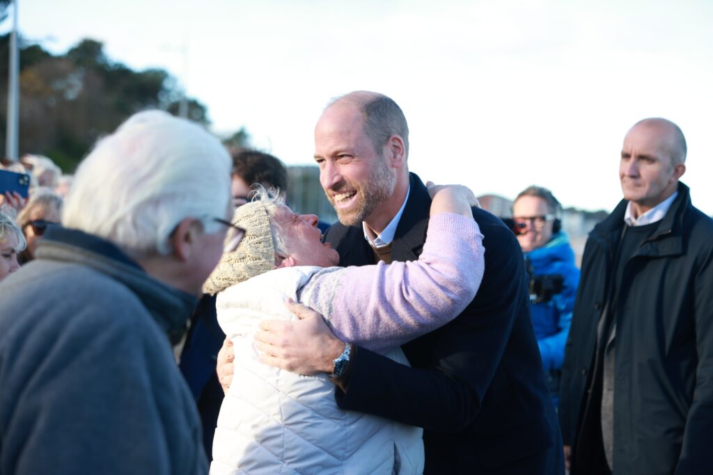Prince William hugging woman in North Wales