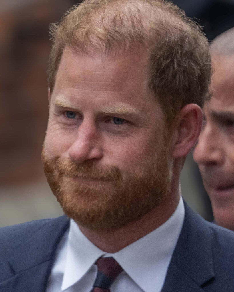 Prince Harry frowning