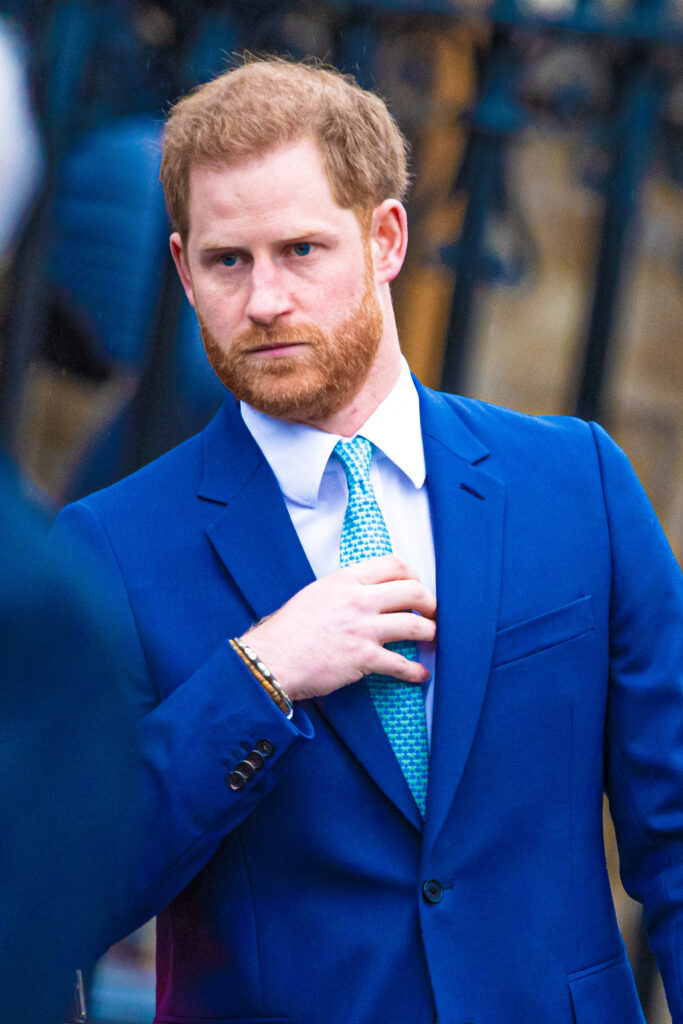 Prince Harry frowning