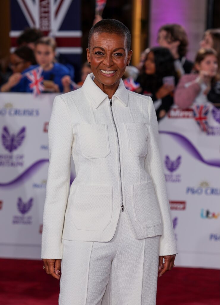 Adjoa Andoh in white suit at event