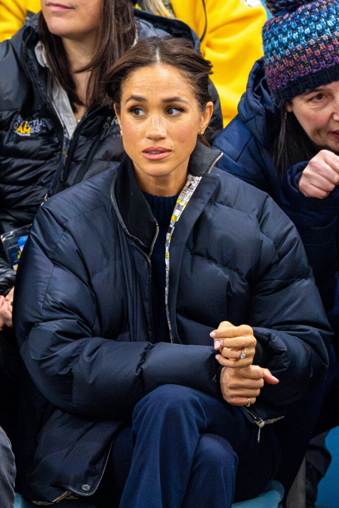 Meghan Markle with a serious expression