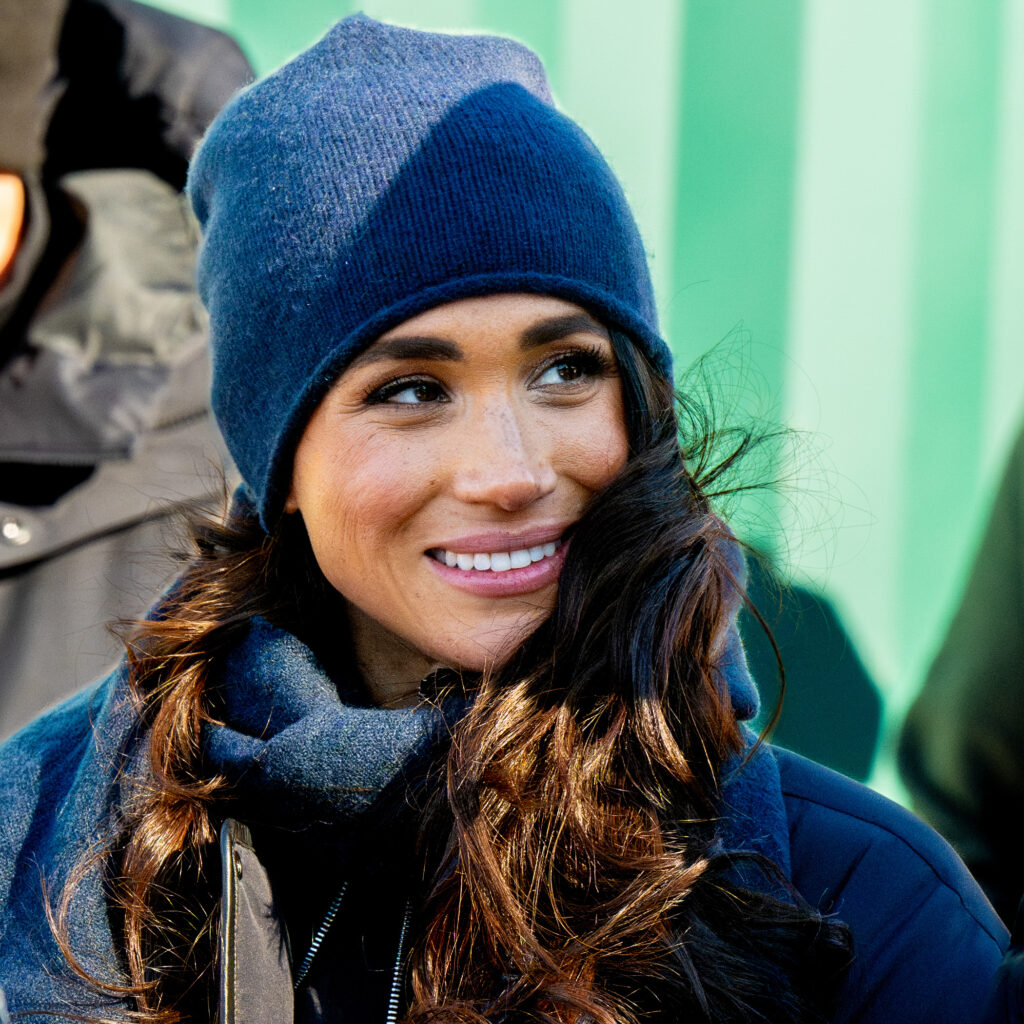 Meghan Markle in beanie hat smiling