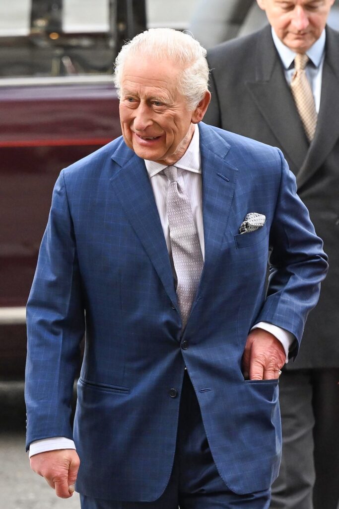 King Charles walking outside