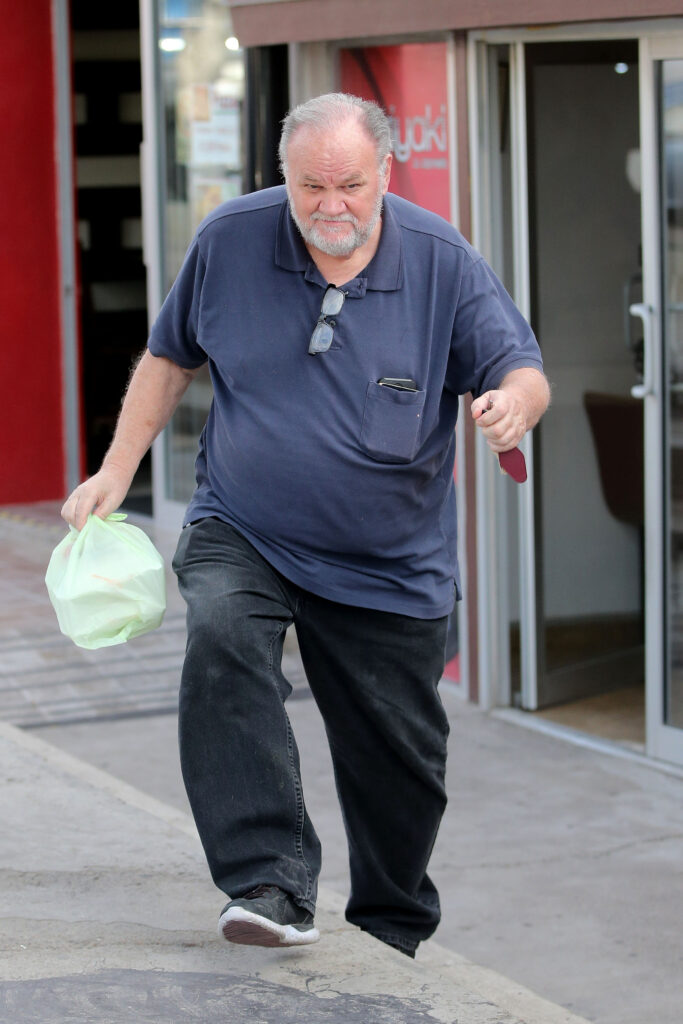 Thomas Markle walking outside