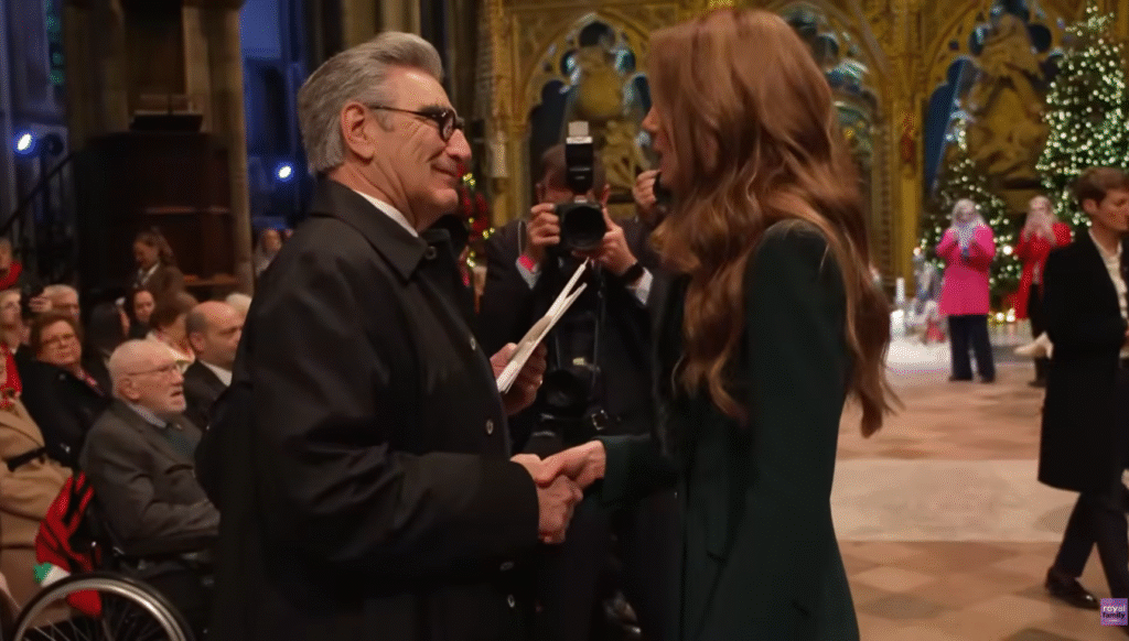 Eugene Levy shaking hands with Princess Kate at Together at Christmas