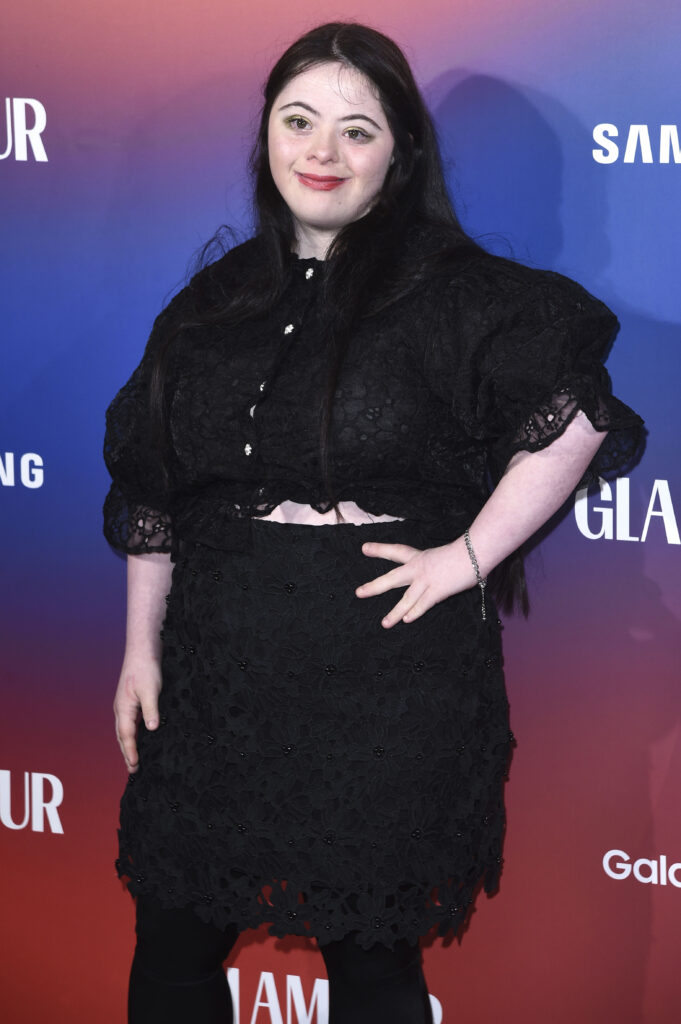 Ellie Goldstein posing at event