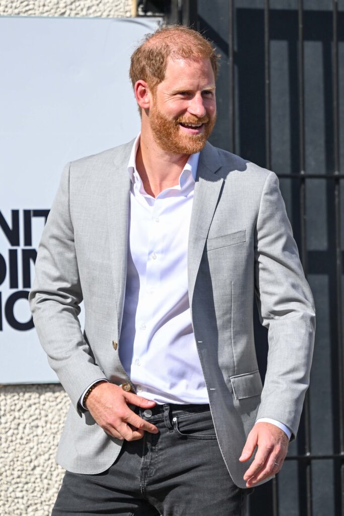 Prince Harry wearing a grey blazer