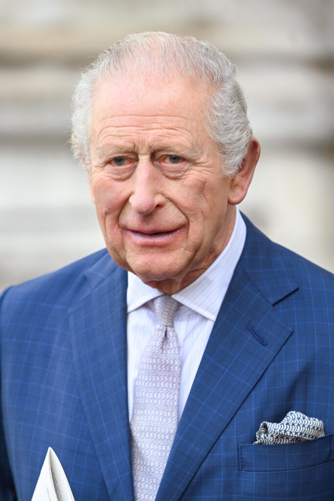 King Charles in blue suit on royal engagement