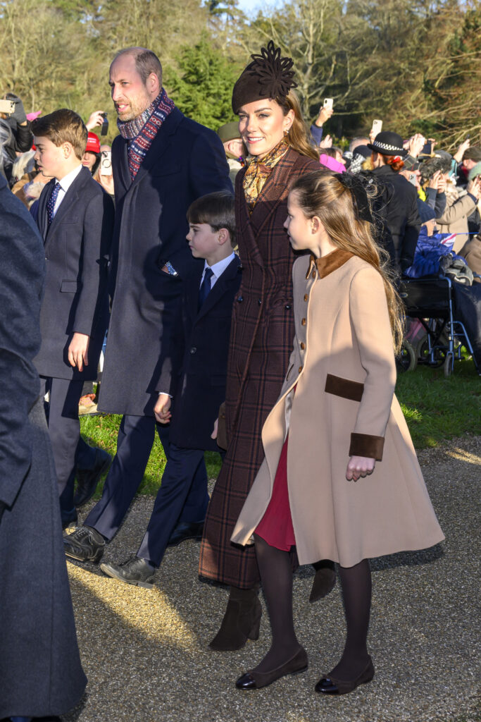 Prince George, Prince William, Prince Louis, Kate Middleton and Princess Charlotte during Christmas Day walkabout