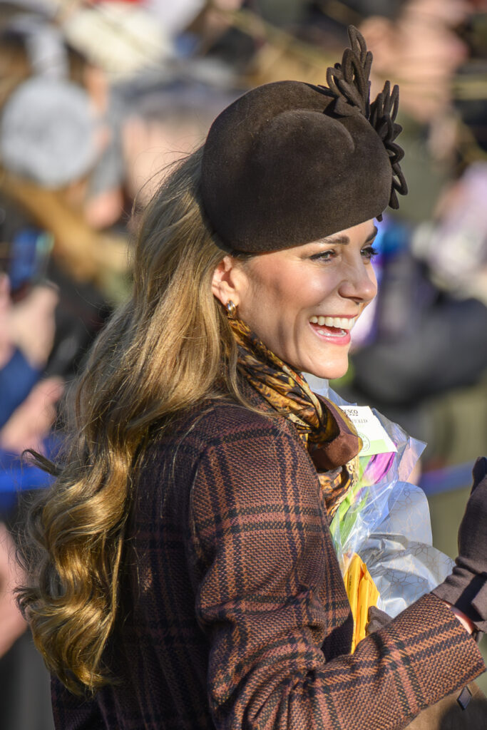 Kate Middleton smiling and waving on Christmas Day