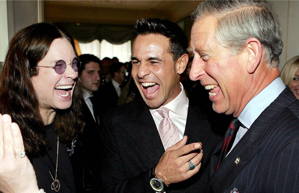 Ozzy Osbourne laughing with King Charles in 2006
