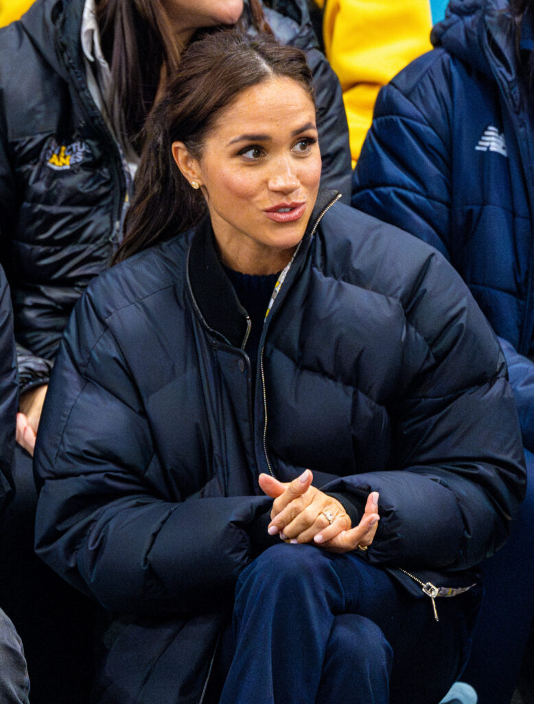 Meghan Markle with a shocked expression