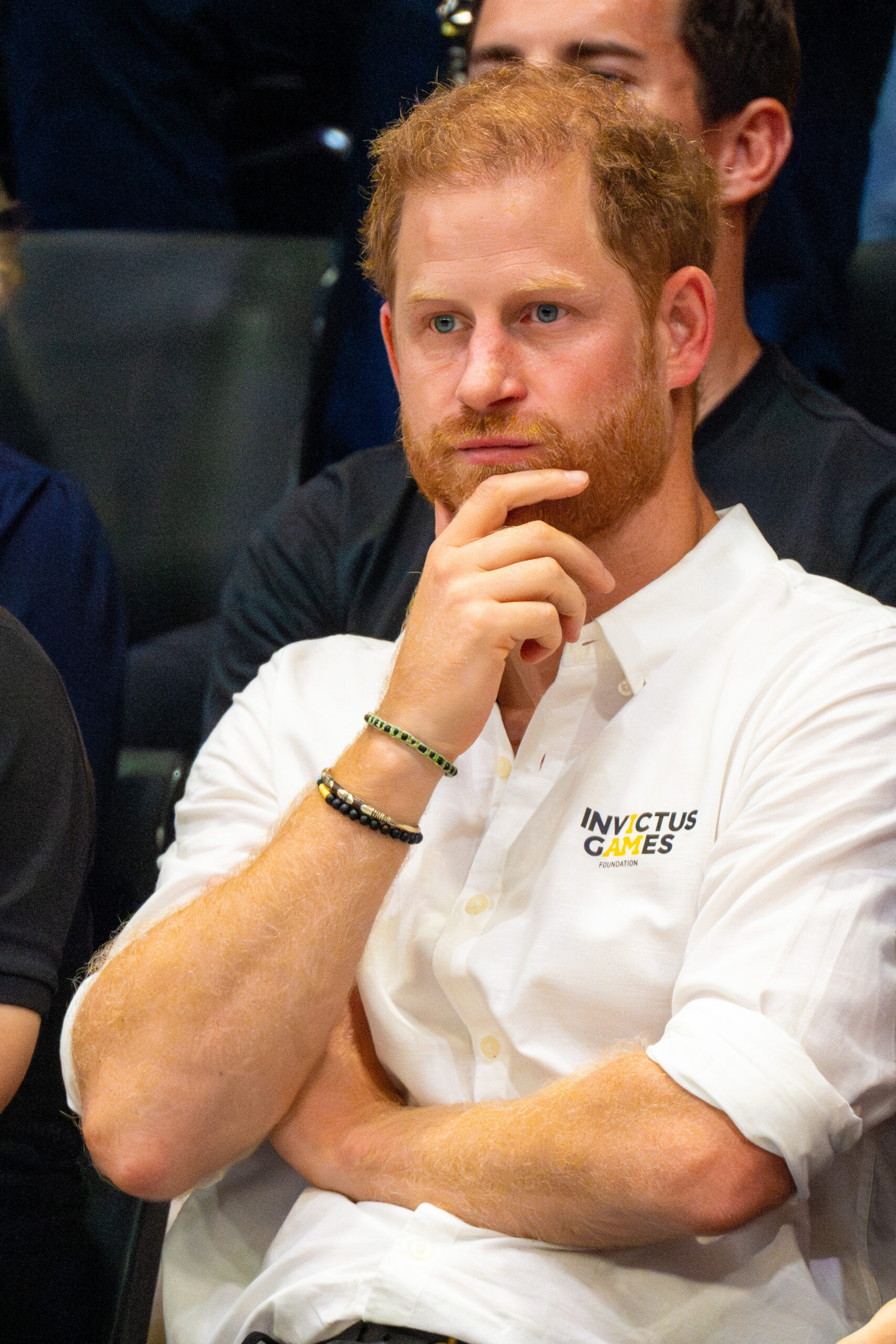 Prince Harry frowning