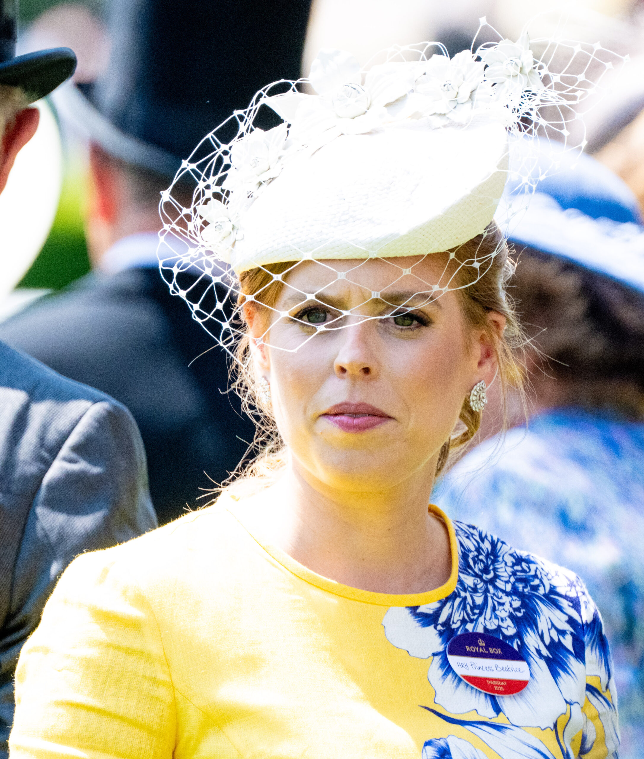 Princess Beatrice in yellow outfit and hat at Royal Ascot