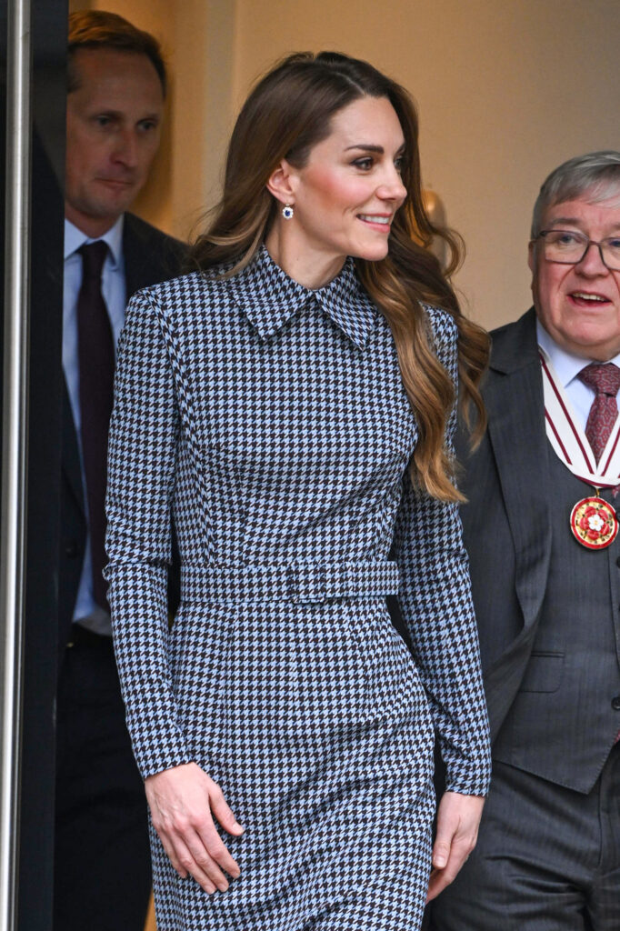 Princess Kate smiling and looking to the side