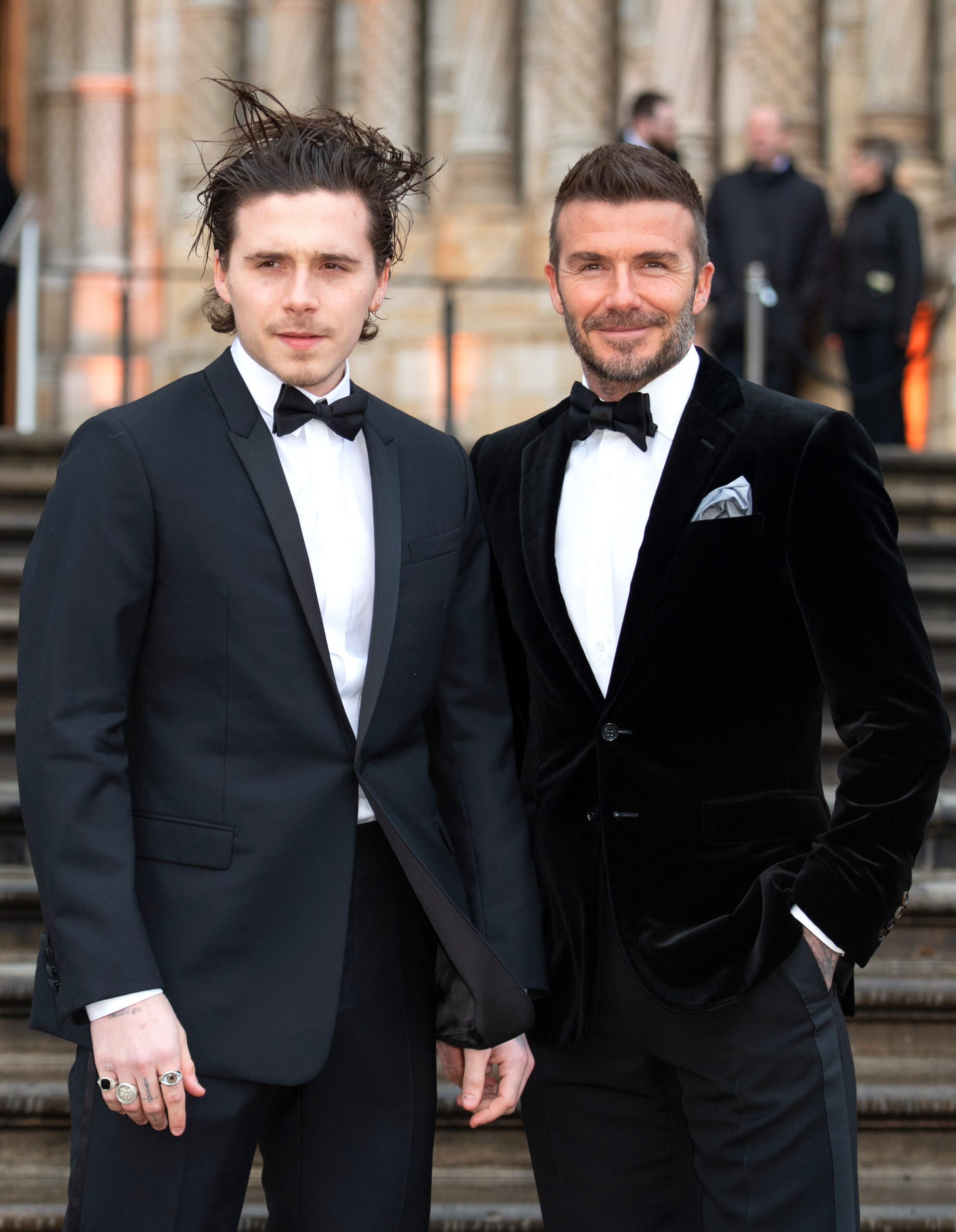 Brooklyn and David Beckham both wearing suits