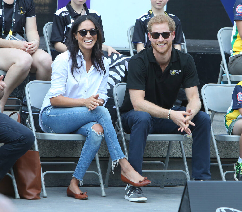 Meghan and Harry smiling