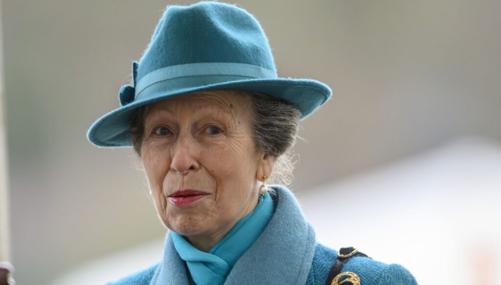 Princess Anne in a blue outfit and hat