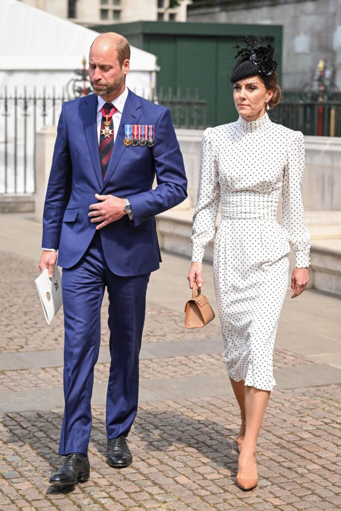 Princess Kate Middleton and Prince William walk next to each other