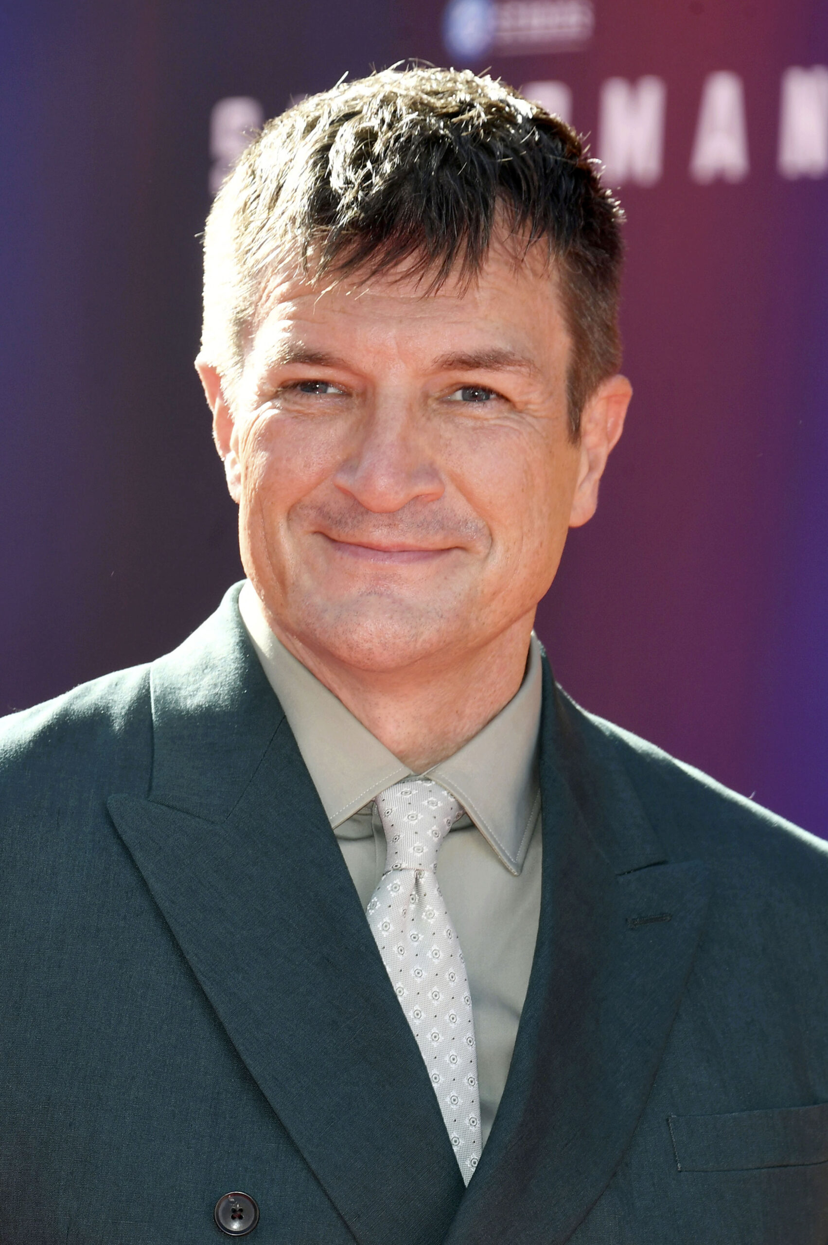 Nathan Fillion smiling