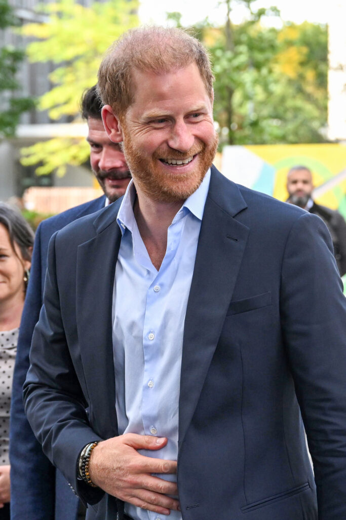 Prince Harry in navy blazer during UK visit