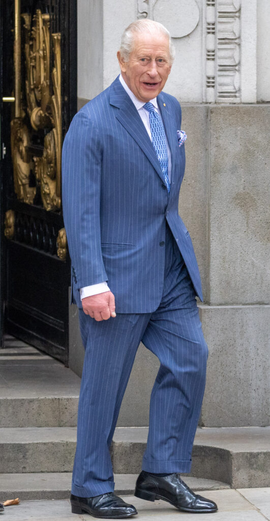 King Charles in blue suit on royal engagement