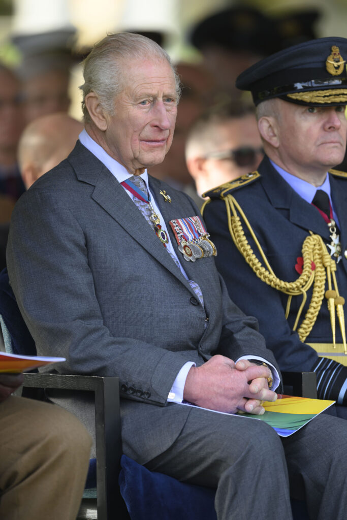 King Charles in grey suit at royal event