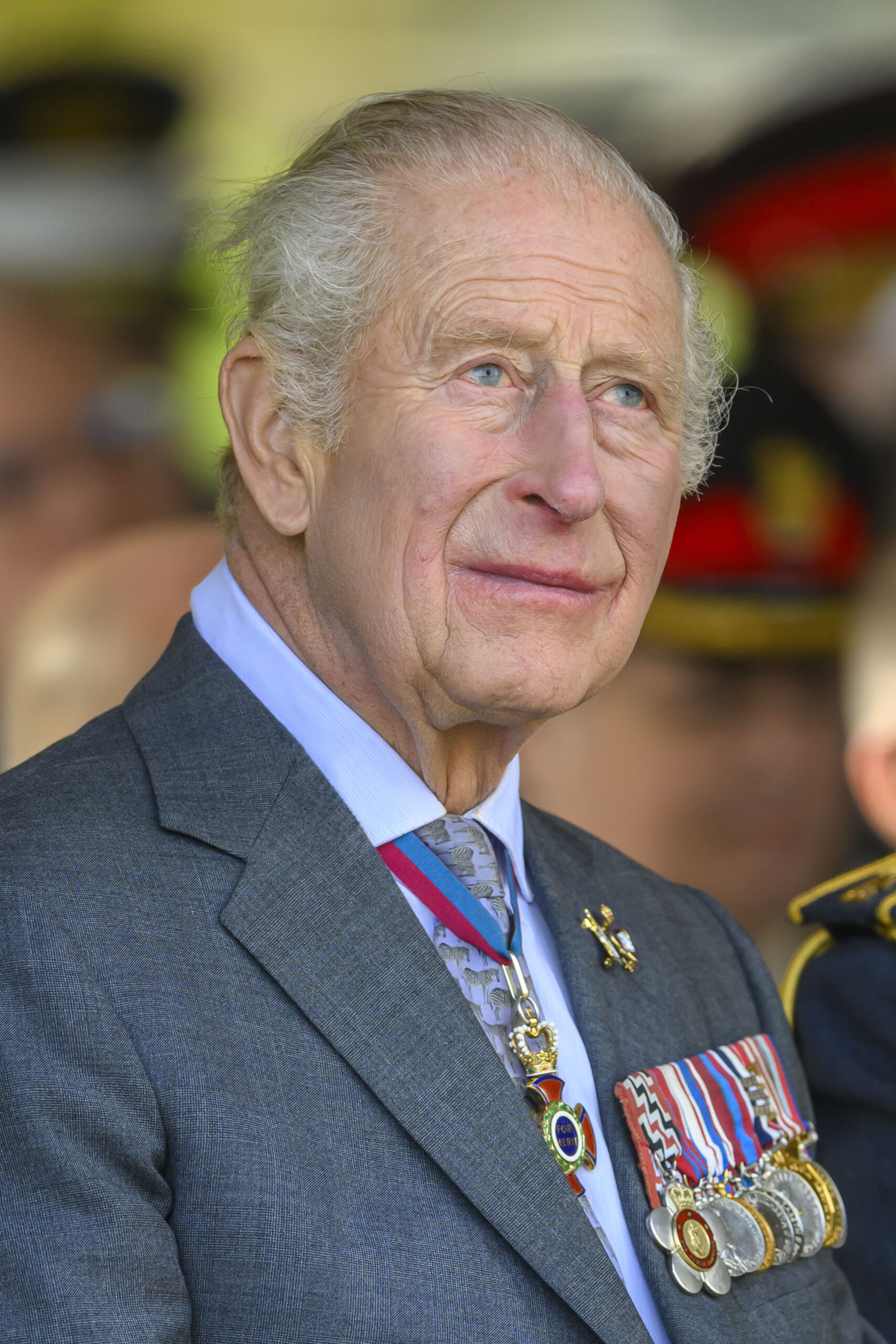 King Charles in grey suit at royal service