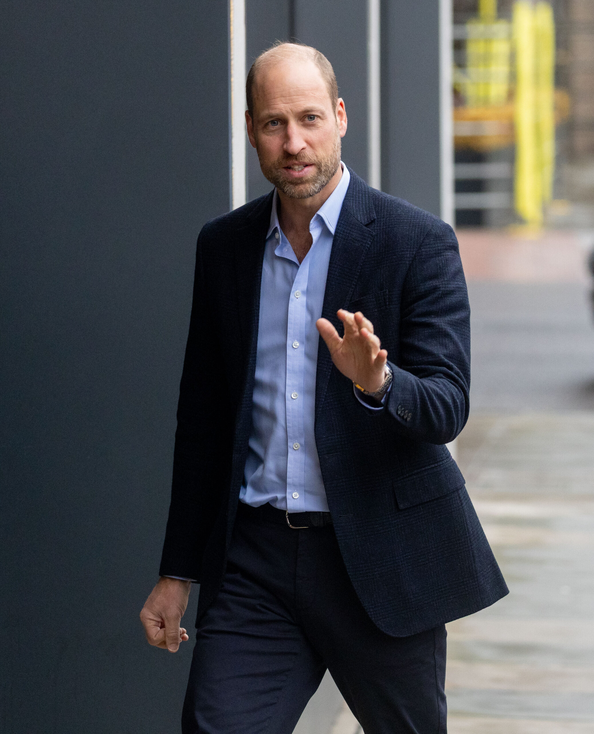 Prince William walking and waving