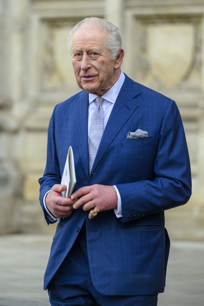 King Charles wears a blue suit