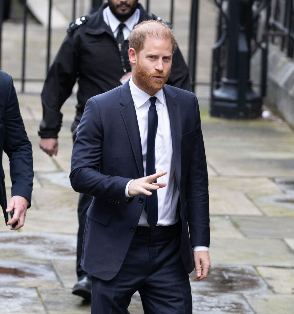 Prince Harry in suit arriving for court